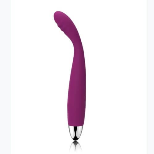 a purple object with a metal tip on a white background