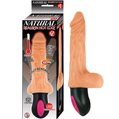 a pink and black vibrating toy in a box