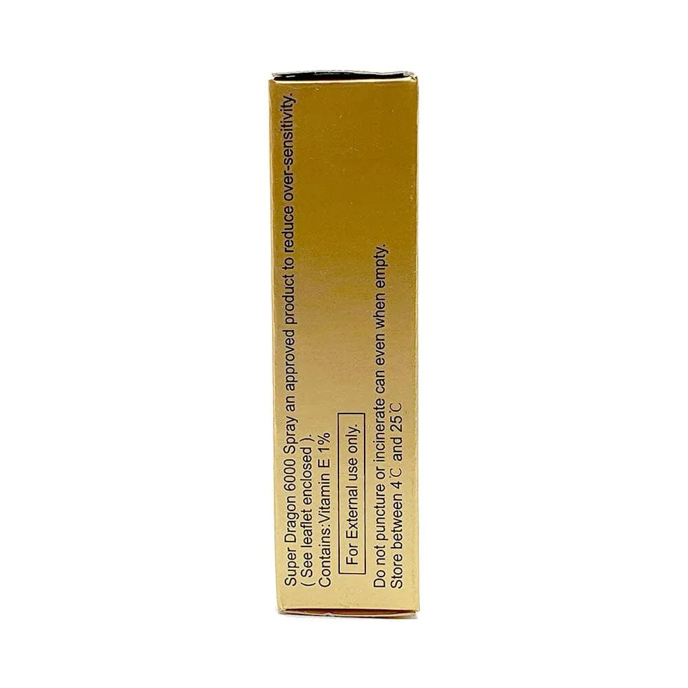 a tube of gold colored lipstick on a white background